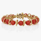 A bracelet with coral beads - фото 1