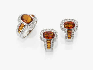 A pair of clip earrings and a ring with citrines and brilliant-cut diamonds