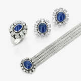 Earrings, ring, and a white gold bracelet with diamonds and sapphires - photo 1