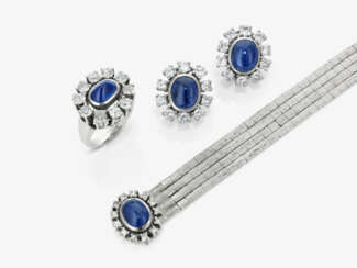 Earrings, ring, and a white gold bracelet with diamonds and sapphires