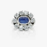 Earrings, ring, and a white gold bracelet with diamonds and sapphires - photo 3