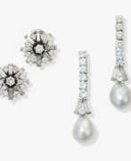 Ear Jewelry. A pair of drop earrings with brilliant-cut diamonds and cultured pearls. A pair of stud earrings with diamonds
