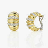 A pair of hoop earrings adorned with octagonal-cut diamonds - photo 1