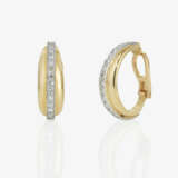 A pair of hoop earrings adorned with octagonal-cut diamonds - photo 1