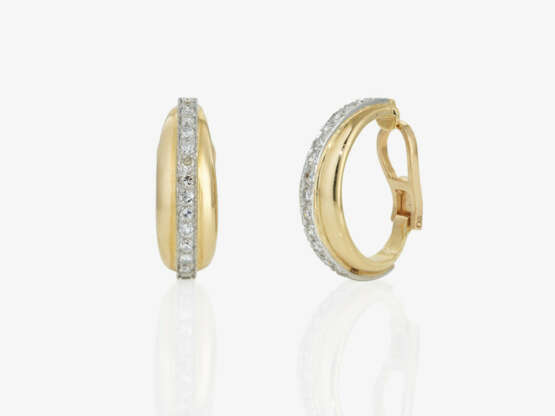 A pair of hoop earrings adorned with octagonal-cut diamonds - photo 1