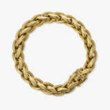 A gold bracelet - photo 1