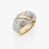 A modern cocktail-style band ring adorned with brilliant-cut and baguette-cut diamonds - фото 1