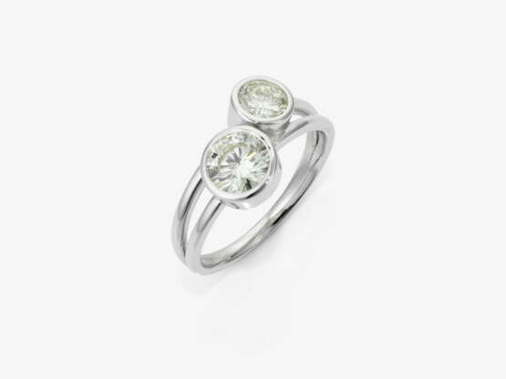 A modified cross over ring set with two brilliant-cut diamonds - photo 1