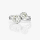 A modified cross over ring set with two brilliant-cut diamonds - photo 2