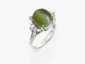 A ring with chrysoberyl and diamonds