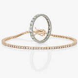 A delicate tennis bracelet adorned with brilliant-cut diamonds and an eternity ring with octagonal-cut diamonds - photo 1