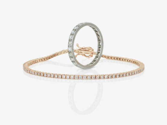 A delicate tennis bracelet adorned with brilliant-cut diamonds and an eternity ring with octagonal-cut diamonds - photo 1