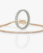 Украшения для рук. A delicate tennis bracelet adorned with brilliant-cut diamonds and an eternity ring with octagonal-cut diamonds