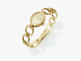A yellow gold Omega ladies wristwatch