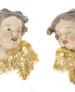 Übersicht. Bildschnitzer des 20. Jh. ''Paar Engelsköpfe'', Holz geschnitzt, polyc…