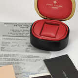 PATEK PHILIPPE, STAINLESS STEEL 'NAUTILUS', REF. 3700/001 - photo 4