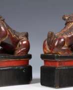 Product catalog. 19th Century Pair of Chinese Guardian Lions in Red and Gold Lacquer