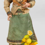 Zitronenverkäuferin mit Zitrusfrüchten - photo 1