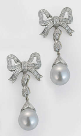 Paar dekorative Perl-Brillant-Ohrgehänge - фото 1 Paar dekorative Perl-Brillant-Ohrgehänge - фото 1