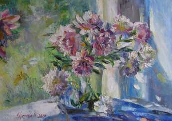 Bouquet of peonies at the window