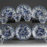 Six sets of blue and white cups and saucers - фото 1