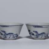 A pair of Ming Dynasty blue and white porcelain cups - фото 1