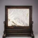 A marble 'dreamstone'-inset wood screen - photo 4