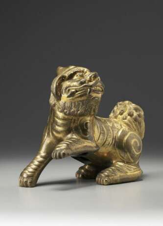 A gilt bronze Buddhist lion - photo 2