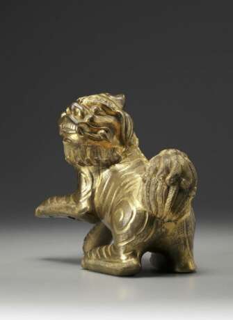 A gilt bronze Buddhist lion - photo 4