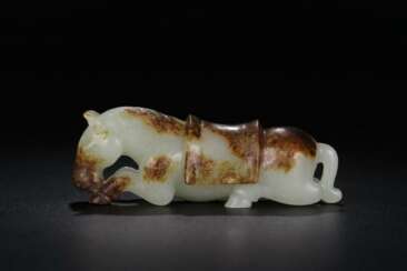 Ming Dynasty Hetian white jade lying horse carving