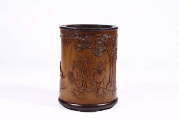 The "Baiyun Mountain People" bamboo carving pen container in the Qing Dynasty