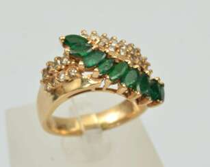 Gold ring with emeralds and diamonds