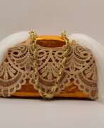 Kunstpelz. Decorative interior sculpture lady's bag