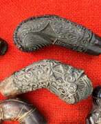 Product catalog. Collection of Kriss Handles, Java, Indonesia, Late 18th Early 19th Century