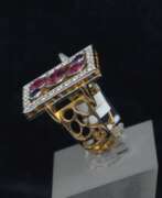 Overview. Gold ring with diamonds, rubies, sapphire