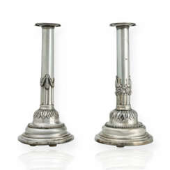 Pair of classicist silver candlesticks