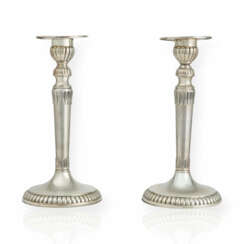 Pair of silver candlesticks