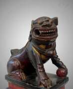 Overview. 19th Century Pair of Chinese Guardian Lions in Red and Gold Lacquer