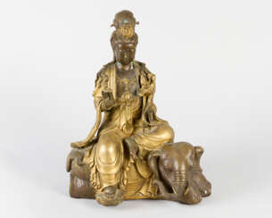 Guanyin sitting on elephant with lotus and bowl in her hands
