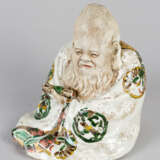 Chinese Porcelain figure of a wise men with script-role and coat - photo 1