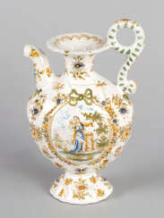 Italian majolica can with one spout and handgrip on oval base
