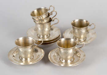 Six silver cups and saucers 