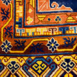 Oriental carpet with ten field decoration bands and rich ornaments in blue red yellow brown and white colours signs of age and use - photo 2