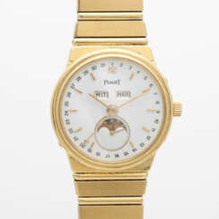 PIAGET Herrenuhr "Polo Calendar", 1980er Jahre. Gelbgold 18 Karat.