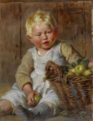 Kleiner Junge mit Apfelkorb