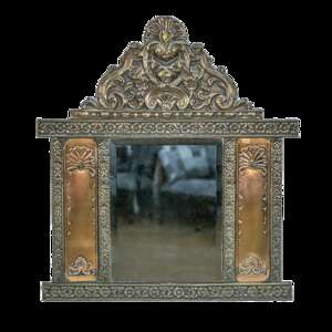 Зеркало для прихожей с щетками в резной раме из латуни первой половины XX века