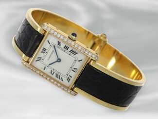 Armbanduhr: hochwertige Damenuhr mit Brillantbesatz und ergänztem Wempe-Armband, 18K Gold-Gehäuse signiert Cartier