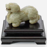 Jade-Figur eines Fo-Hundes im archaischen Stil - фото 1