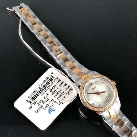 Armbanduhr: "REGENT". Edelstahl bicolor. Mineralglas. Ungetragen aus Uhrmachernachlaß. Tadellos. - Foto 2