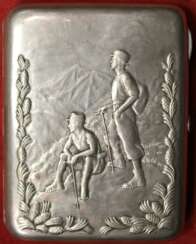 Cigarette case with embossed image of 
